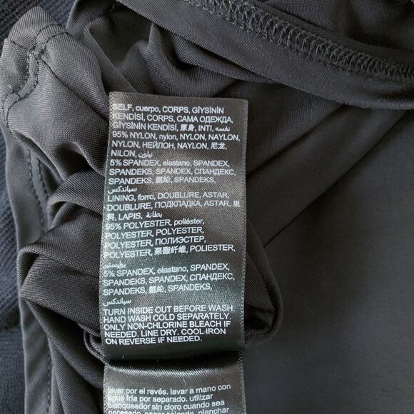 BEBE Black Sexy Cutout Flare Skater Halter Lined Dress size Large - Picture 12 of 13